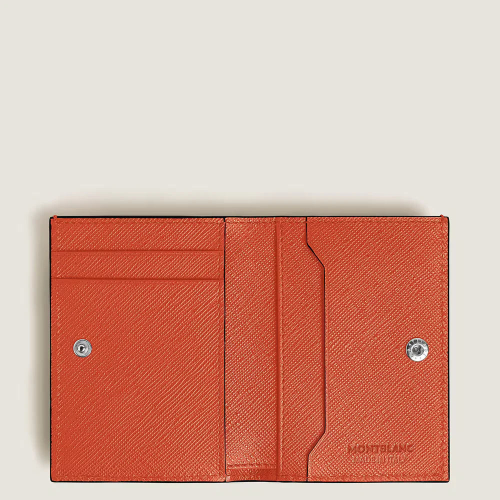 Detailansicht geprägtes Sartorial-Leder in Mandarin Montblanc Mini-Geldbörse mit ikonischem Emblem hochwertige Verarbeitung für anspruchsvolle Kundschaft